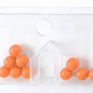 Transparante Rekendoos met oranje ballen voor zelfstandig oefenen met getalsplitsingen en rekeninzicht.