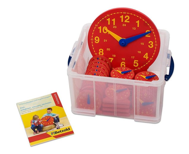 Klassenset Klokkijken met 25 leerlingklokjes en instructieboekje in doorzichtige opbergdoos.